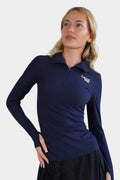 Lemii Label - Woman wearing a navy long-sleeve shirt with a logo on a white background