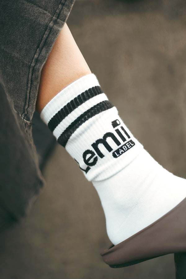 Lemii Label - white crew Sock on Foot- black lines at the top
